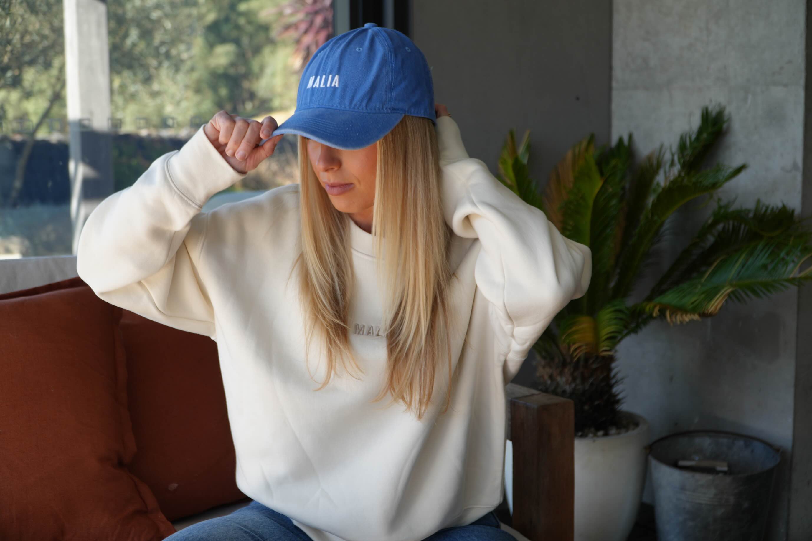 Elevate your accessories with the Malia Blue Washed Cap, crafted for sun-soaked living.