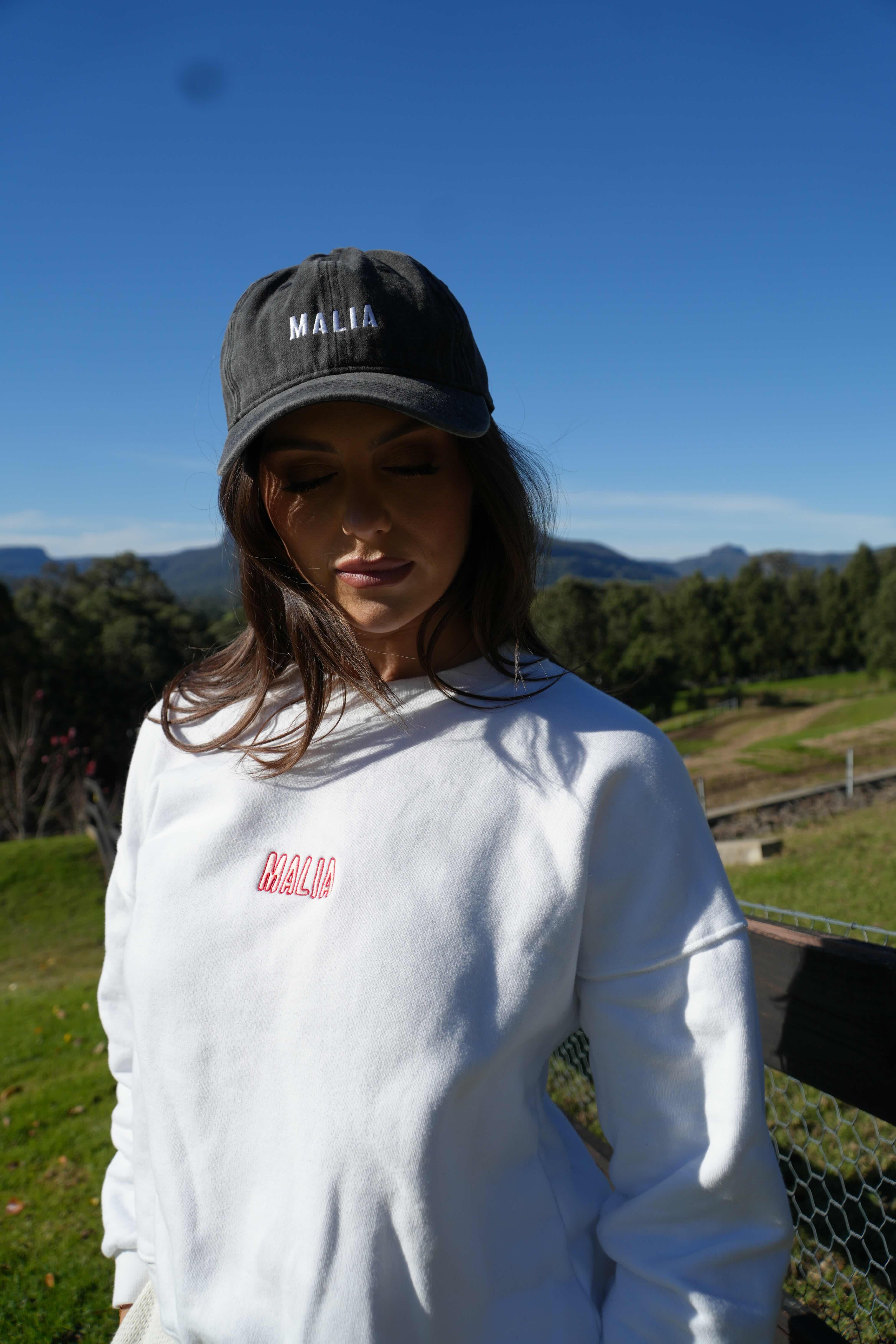 Designed for everyday wear, this charcoal Malia cap pairs perfectly with slow, sun-soaked living.