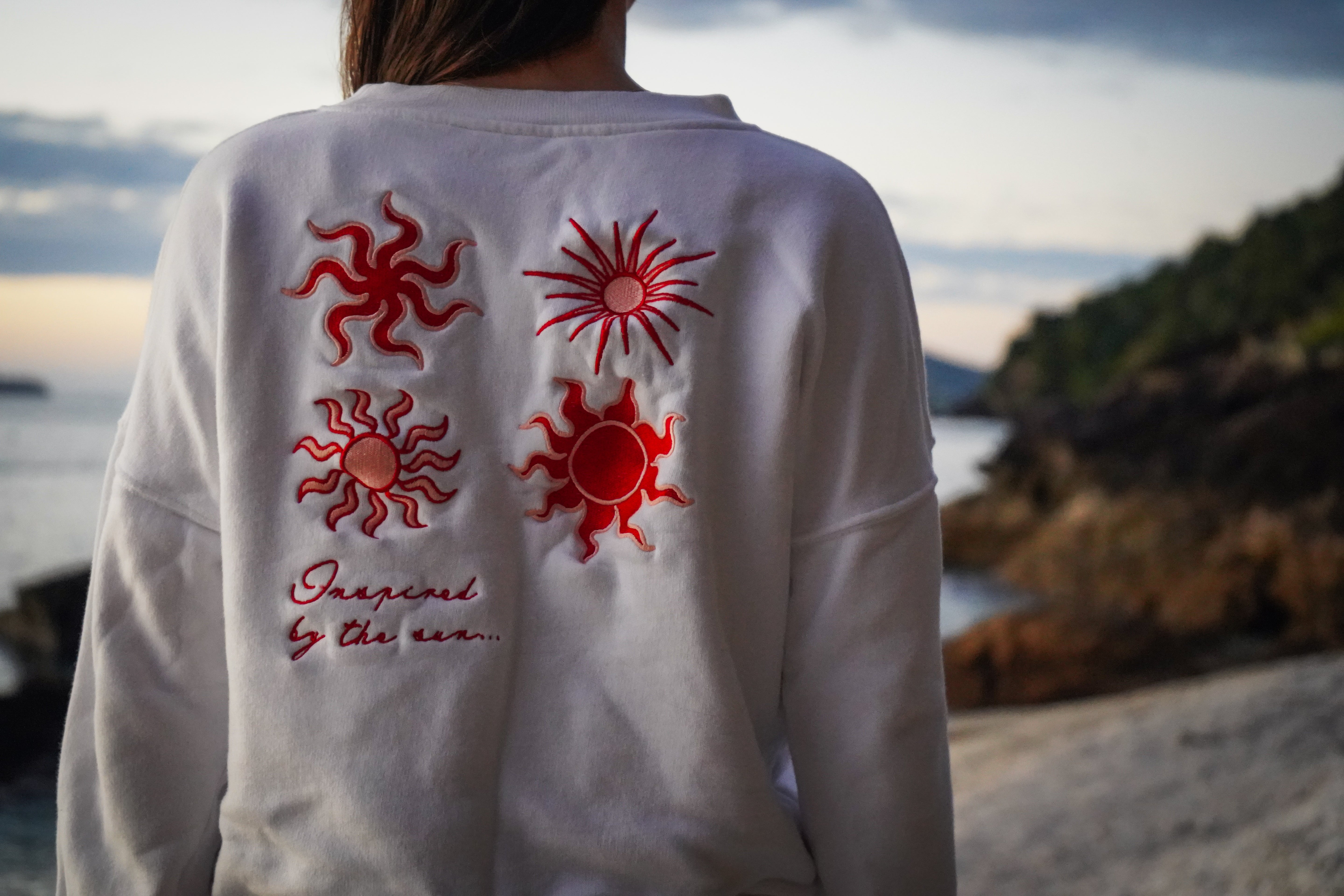 Inspired by the sun Jumper - detailed red and pink sun embroidery design on 100% natural cotton fleece jumper. Malia the label Jumpers