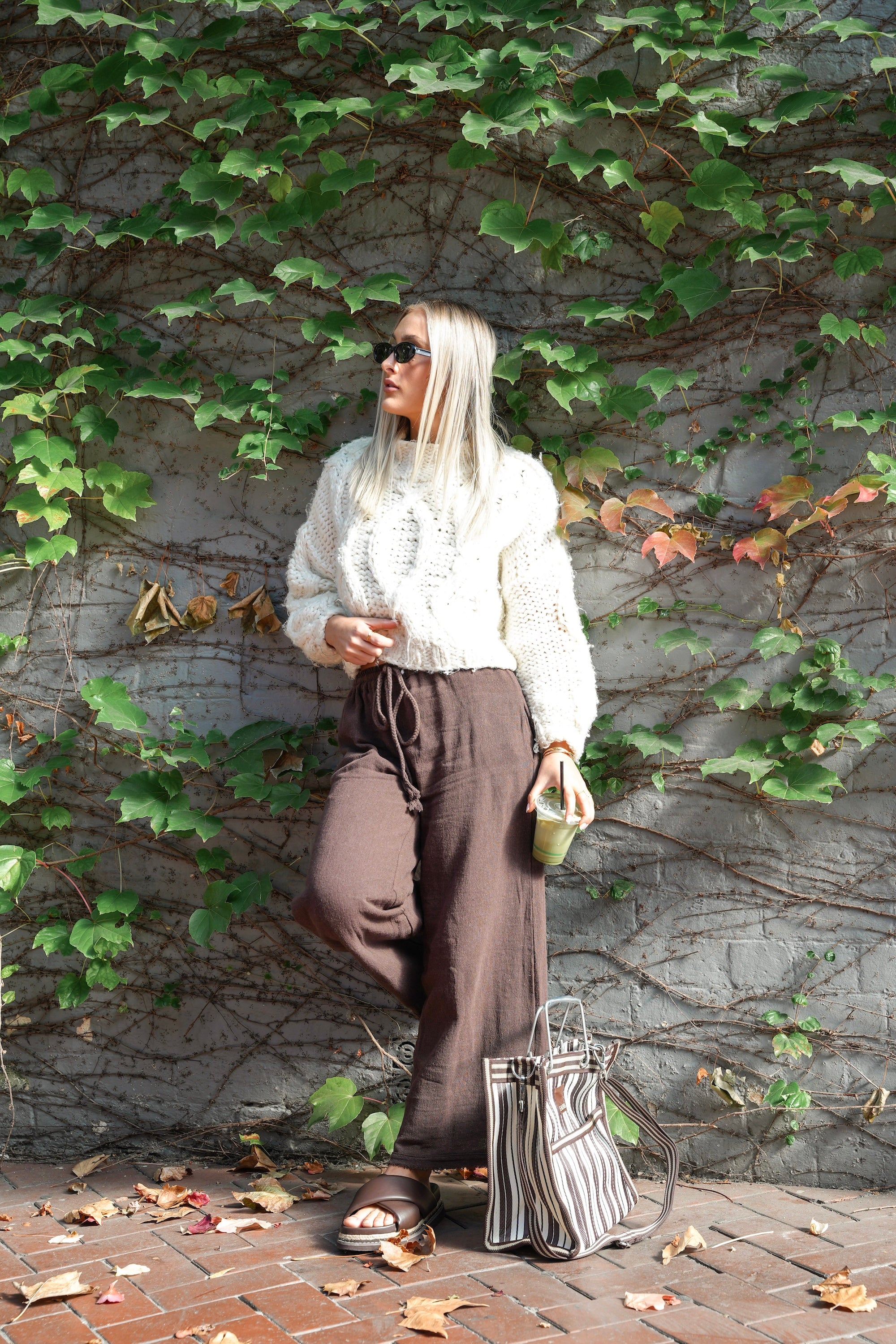 Chocolate mila pants layered with knit - Malia the label - slow fashion