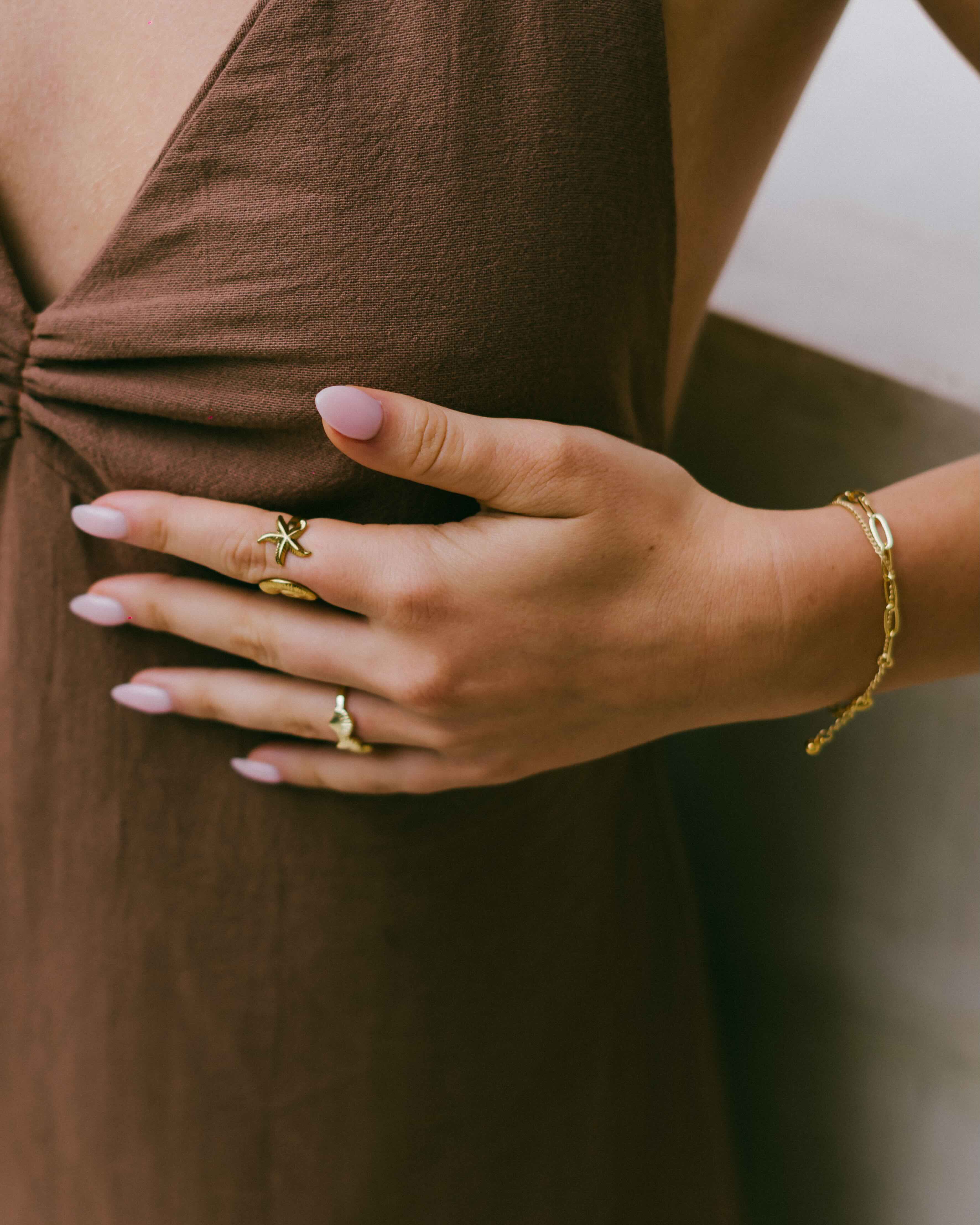 Shop the Delta Chain Bracelet—a two-in-one design featuring a fine chain and a paperclip chain for an instant layered look. Minimalist, modern, and perfect for everyday wear.