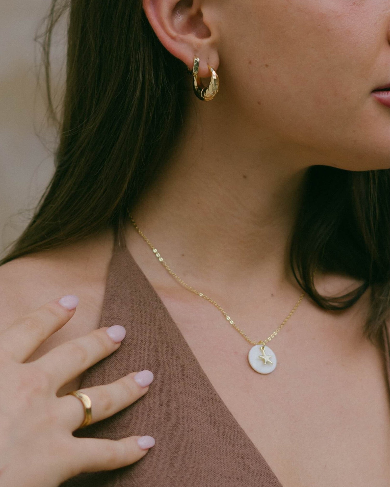 The Dune hoops are a hammered hoop ring designed for both statement and everyday wear. Jewellery by Malia the label