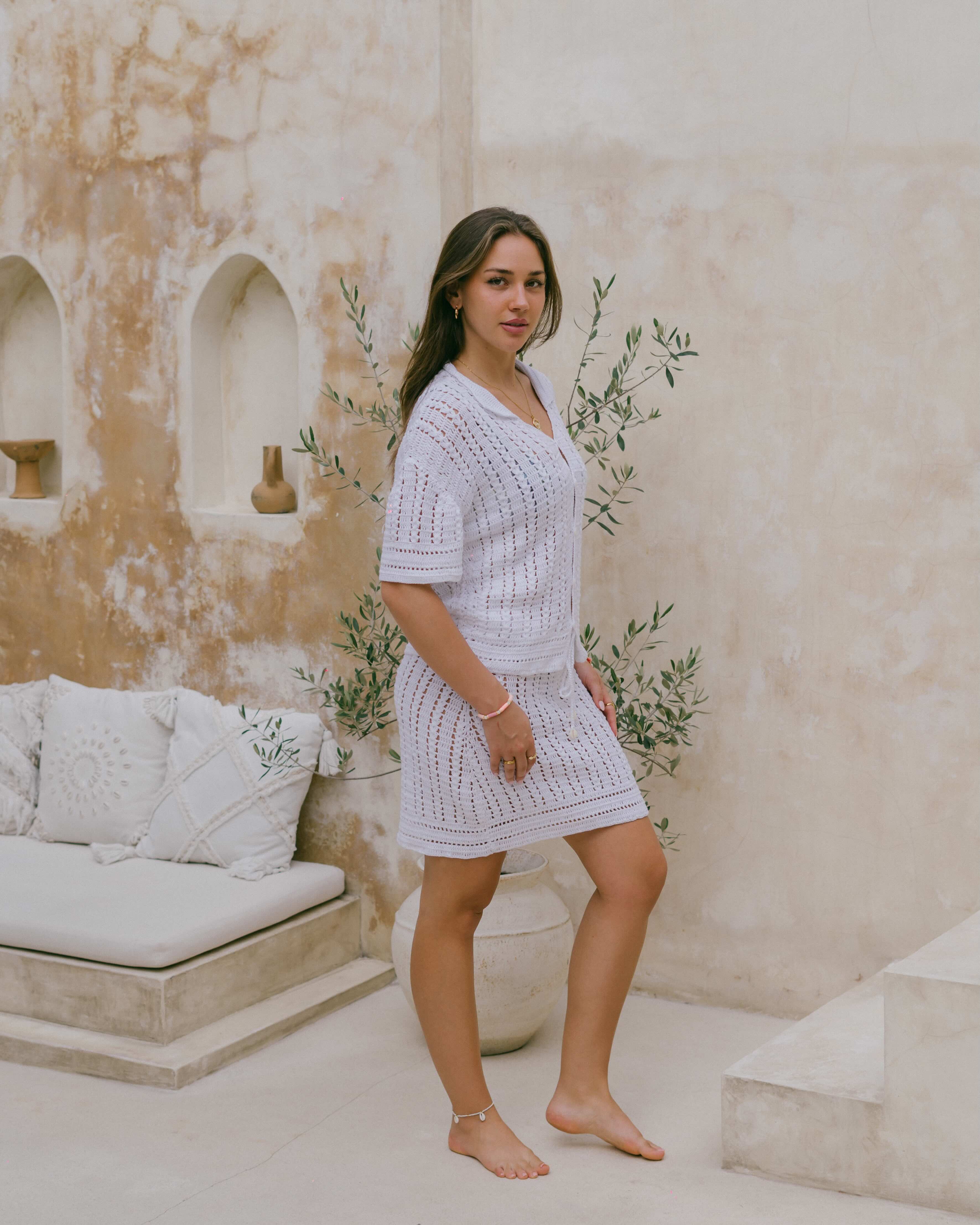 The White Sands Crochet Skirt is a versatile summer essential — wear it over swimwear or pair with the matching shirt for effortless coastal style.