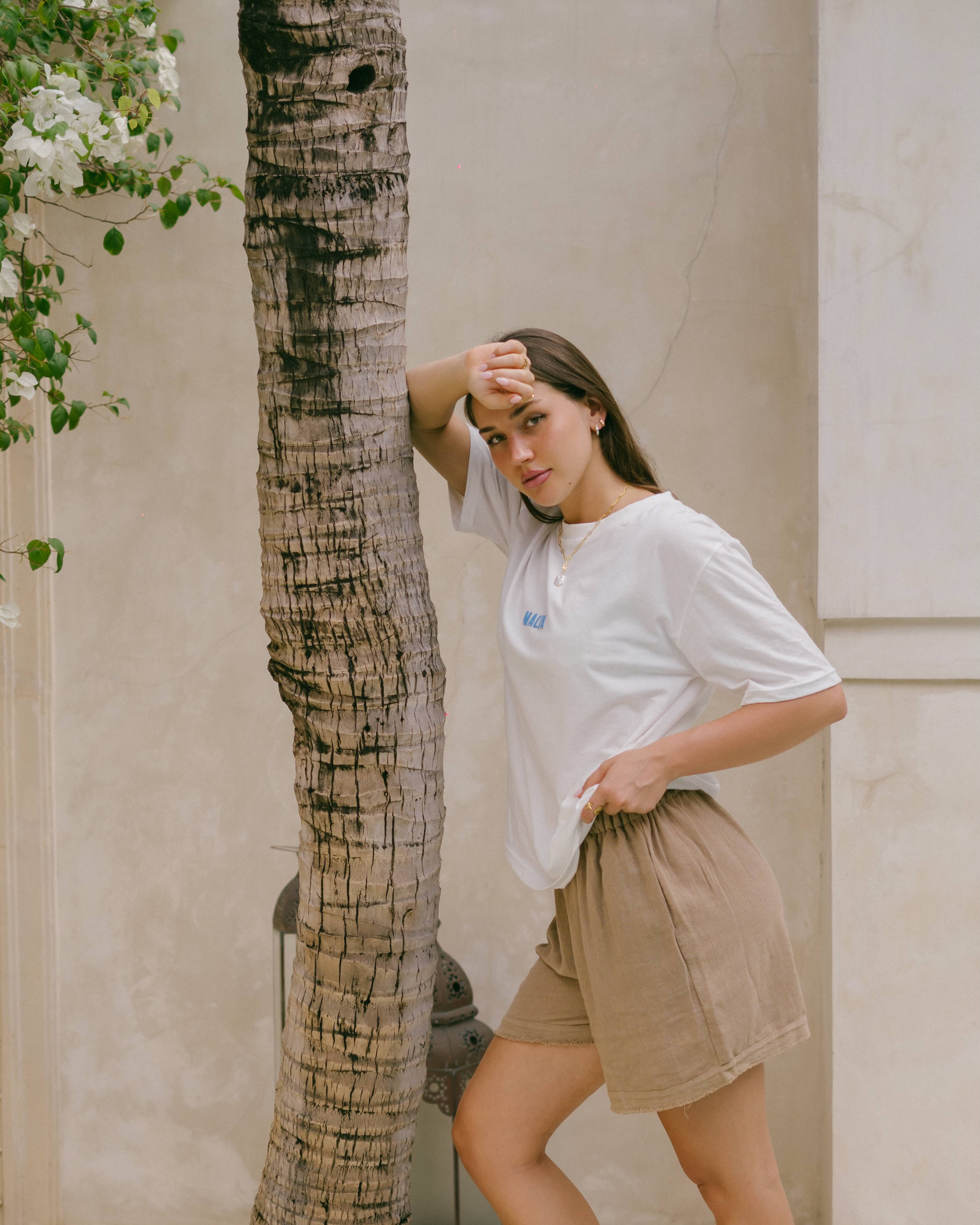 The Malia Organic Cotton Tee is crafted from 100% organic cotton with a relaxed oversized fit, featuring a mindful beach-inspired print.