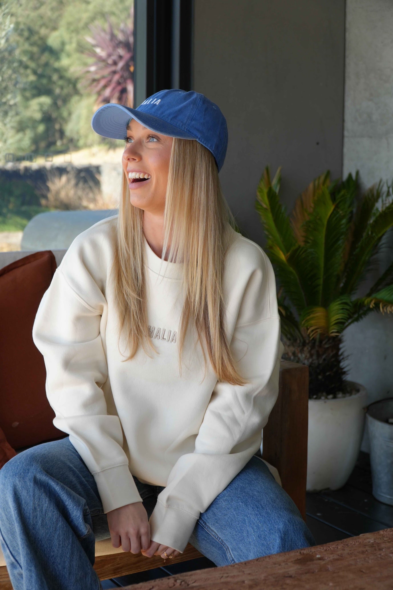 Embrace coastal style with the Malia Blue Washed Cap, featuring a sun-faded finish and adjustable fit.