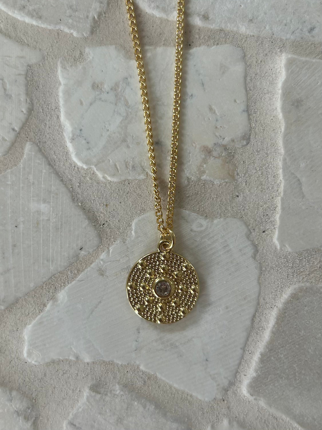 18k gold plated circle pendant with texture and centre rhinestone - Malia jewellery -Inner light Necklace